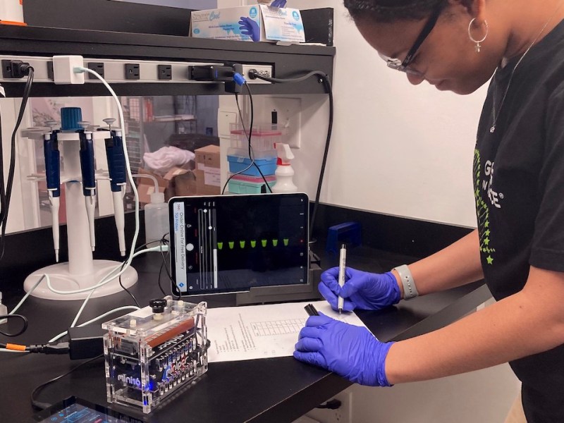 Pristine Onuoha logs data during a pilot run of her experiment. - NASA