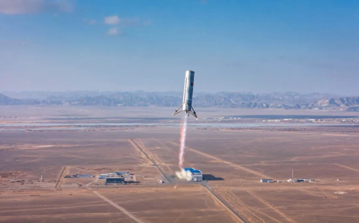 A Landspace Zhuque-3 prototype rocket stage, powered by a methane-liquid oxygen exhuast plume, in the skies above the desert at Jiuquan spaceport, Jan. 19, 2024.